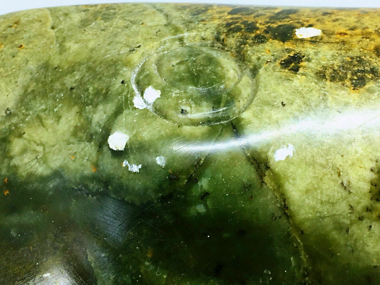 Jade(tough, Green Mineral Either Jadeite Or Nephrite Amphibole)frog With A Book photo Art