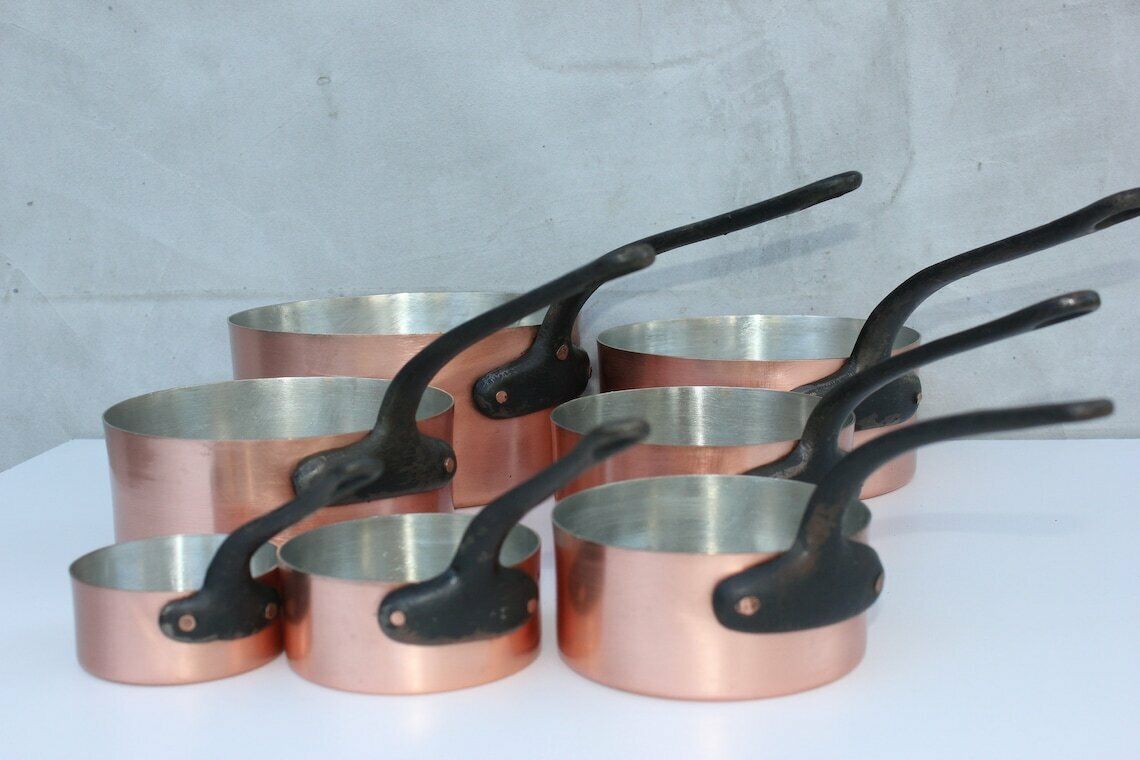 Vintage Copper Pans, Set Of Seven Saucepans With Metal Handles, Rustic Kitchen Utensils And Decoration photo furniture
