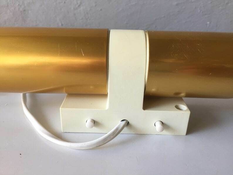 photo furniture Erco 70s Pair Of Wall Sconces   Gold Coloured Metal Body   Plastic Base   Twin Head German Lighting