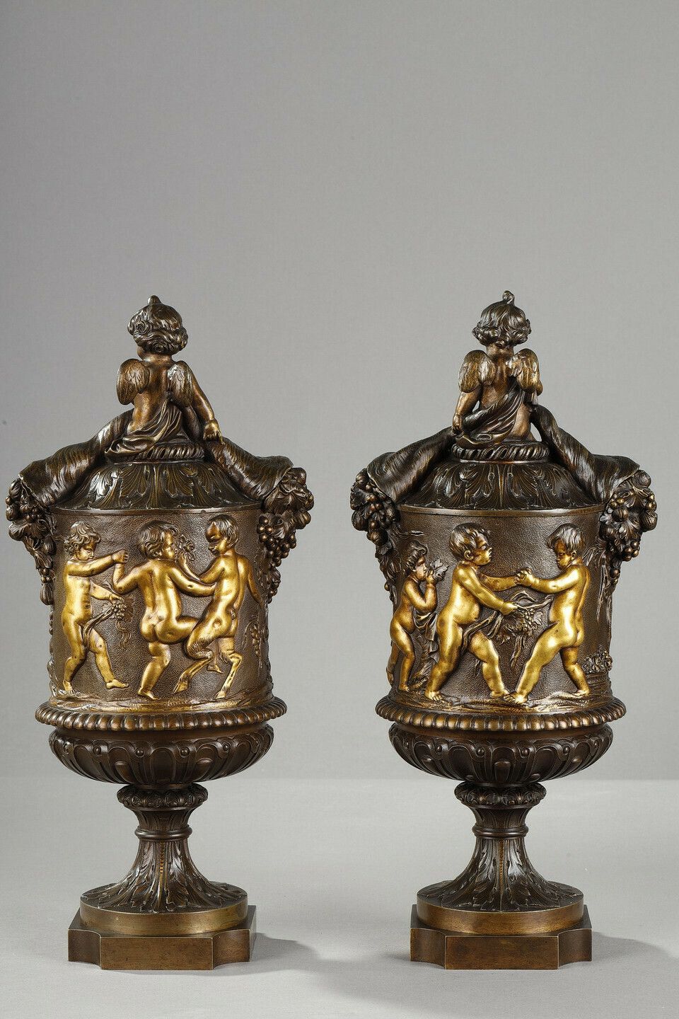Pair Of Covered Vases, In Finely Chased Bronze With A Rich Rotating Decoration photo for sale