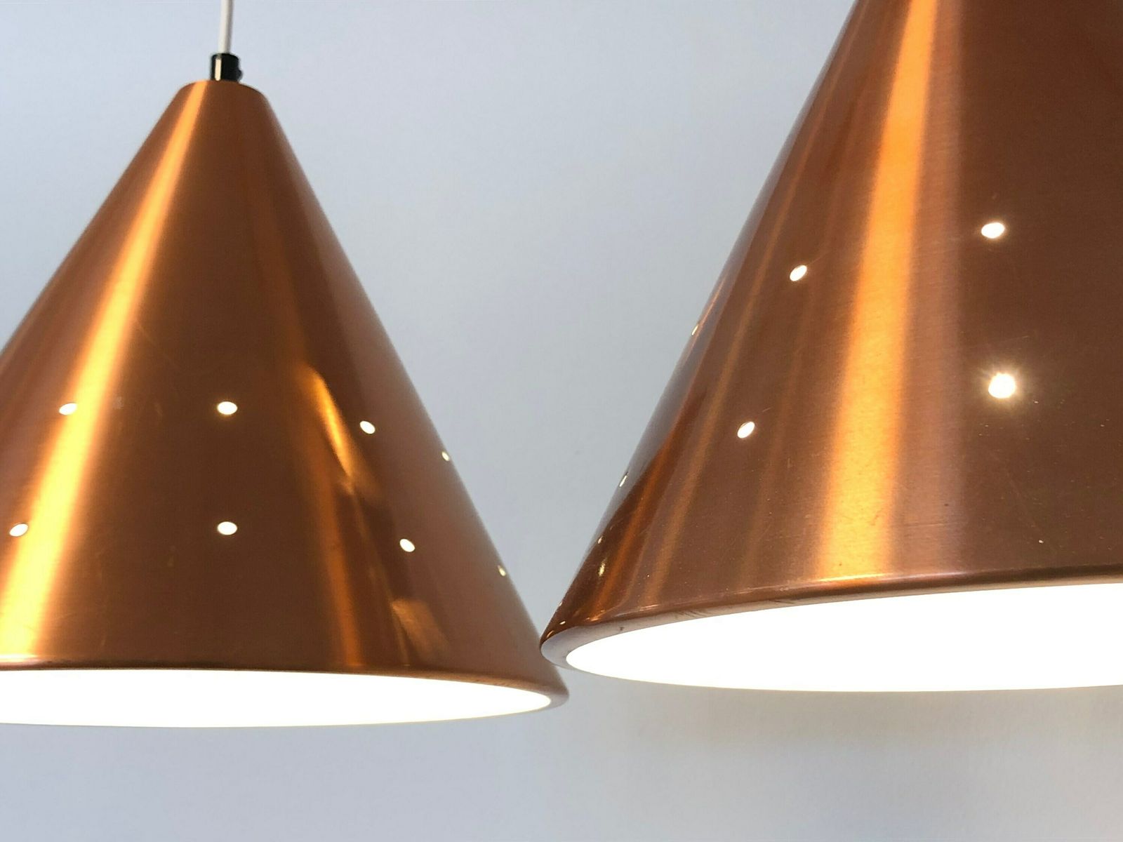 Pair Of Gorgeous Vintage Design Ceiling Lamps From Denmark With Shades In Warm Copper Coloured Aluminium With Perforated Holes photo for sale