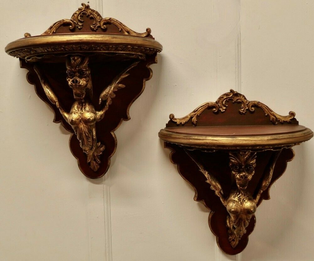 A Large Pair Of Italian Carved Gilt Wall Brackets