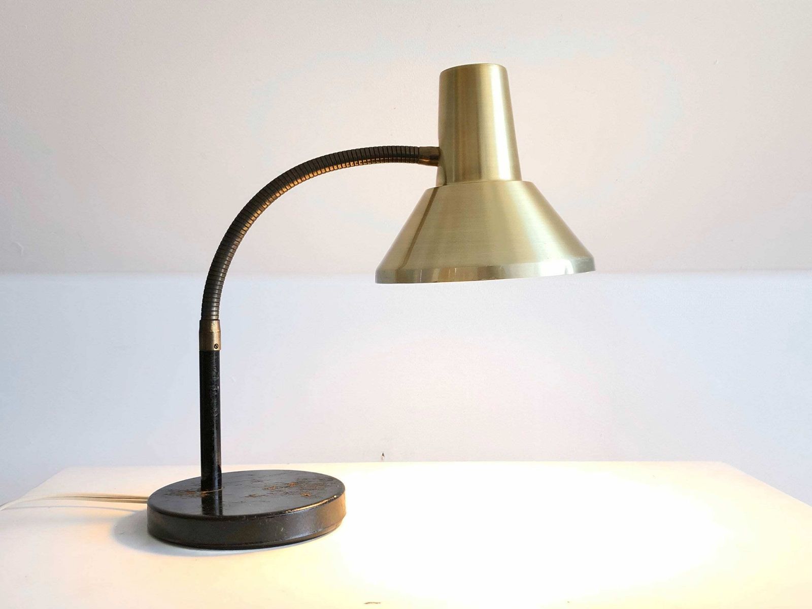 Vintage Classic Table Lamp In Cool Design With Golden Shade, Flexible Brass Neck And Patinated Black Metal Base