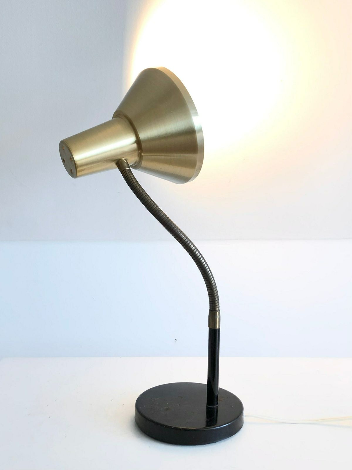 Vintage Classic Table Lamp In Cool Design With Golden Shade, Flexible Brass Neck And Patinated Black Metal Base photo furniture