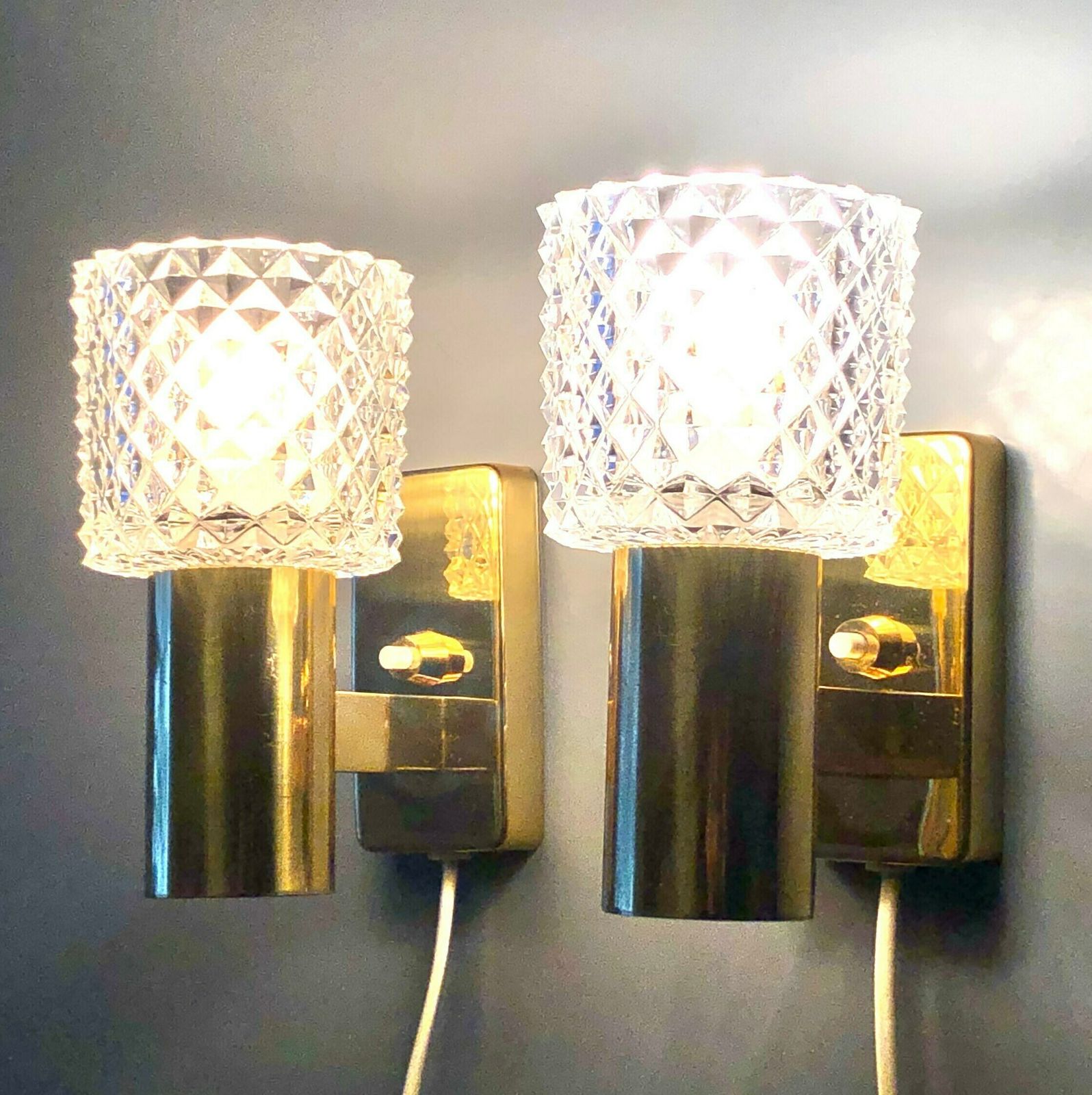 Pair Of Elegant Danish Mid Century Brass Wall Lamps In Modernist Design With Beautiful Crystal Shades
