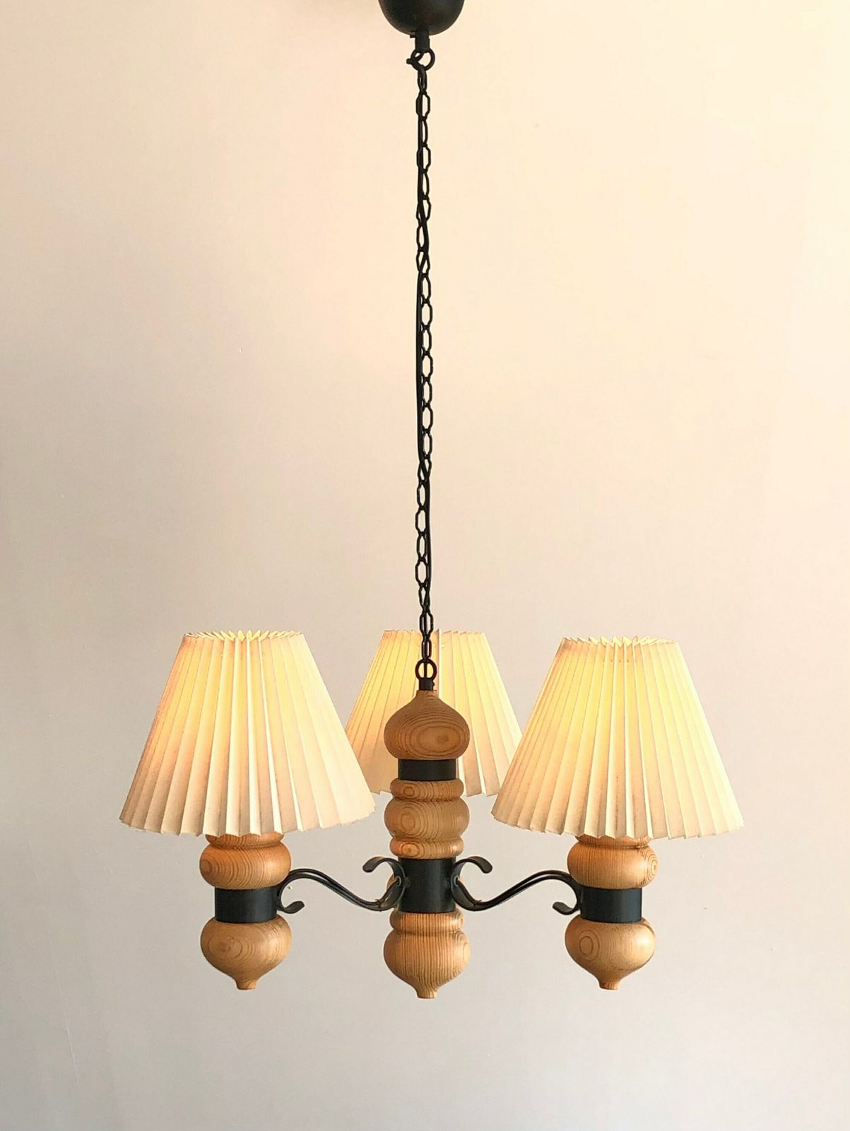 Gorgeous And Cozy Danish Mid Century Vintage Pine Wood Three Armed Ceiling Lamp With Black Metal Details And White Pleated Fabric Shades photo for sale