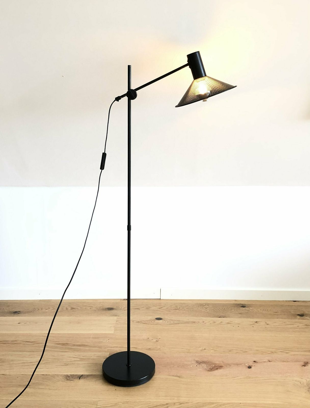 Original Mid Century Modern Danish Floor Lamp In Perforated Metal With Black Paint And Adjustable Shade photo furniture