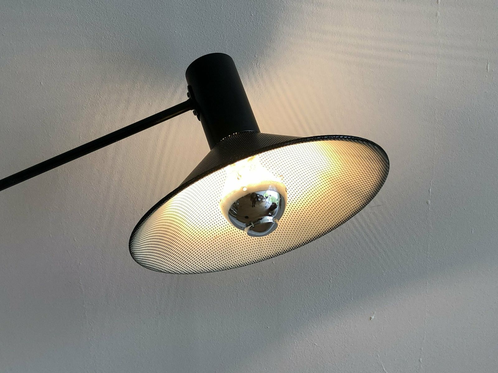 Original Mid Century Modern Danish Floor Lamp In Perforated Metal With Black Paint And Adjustable Shade photo for sale