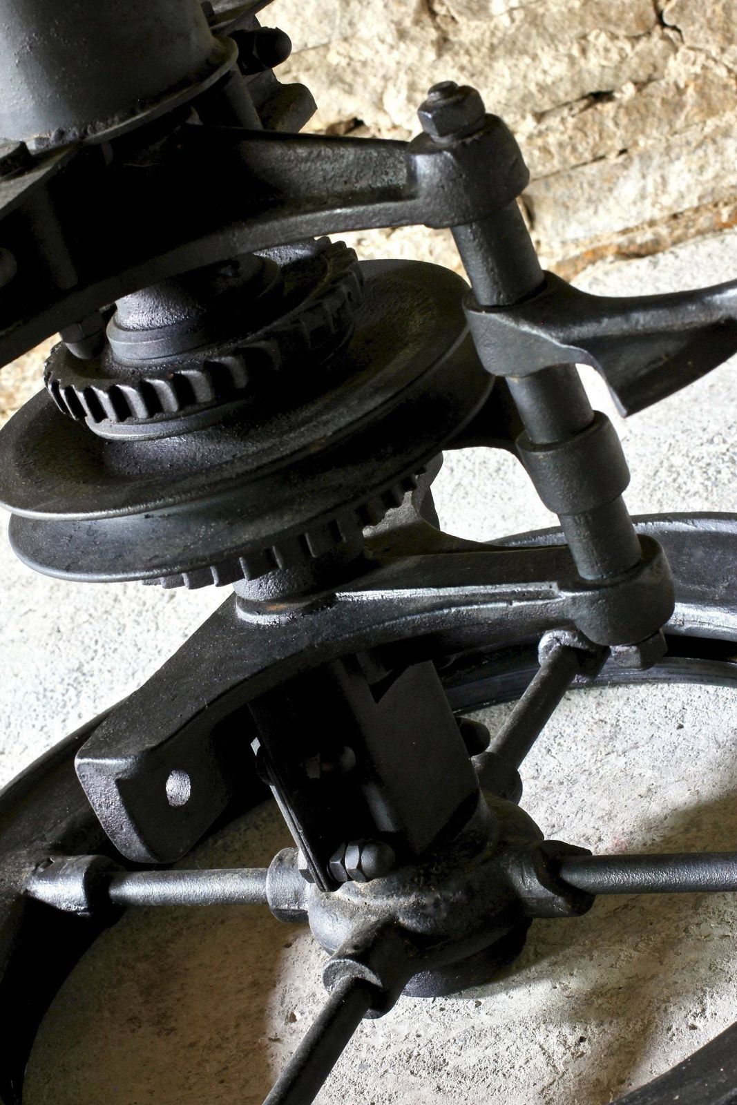 Shift Reclaimed Chunky Scorched Timber Circular Table With A Heavy Pedestal Base Made Out Of An Old Gear System photo furniture