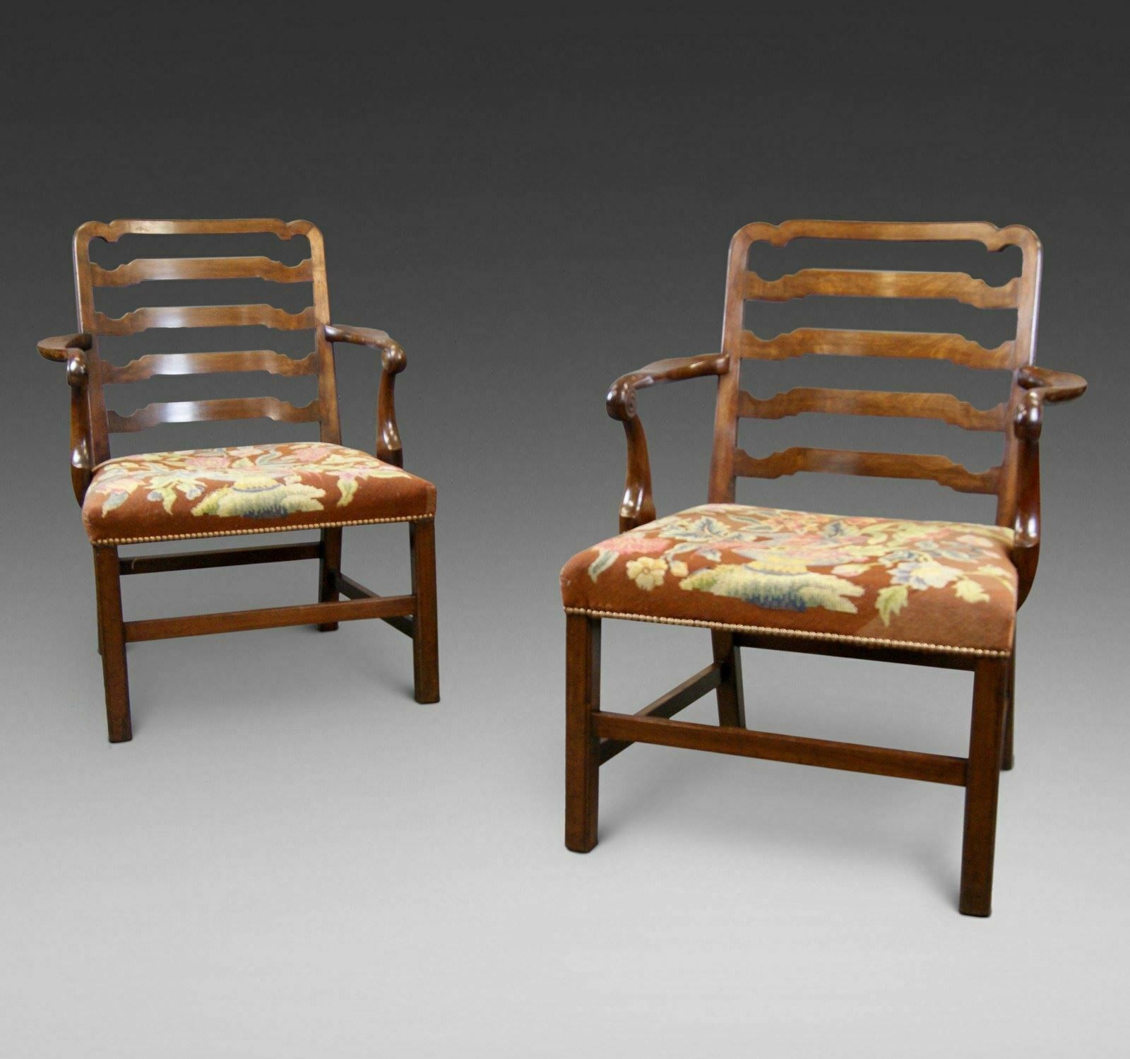 A Pair Of Chippendale Period Arm Chairs