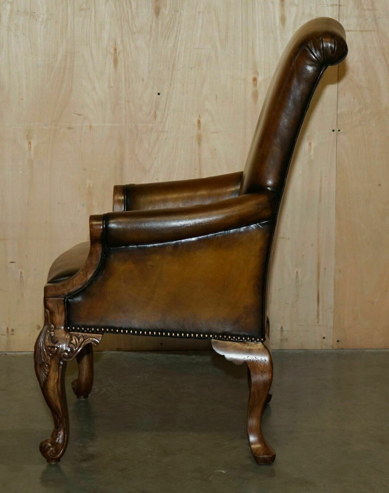 photo vintage Pair Of Antique Heavily Carved Hand Dyed Brown Leather Restored Throne Armchairs