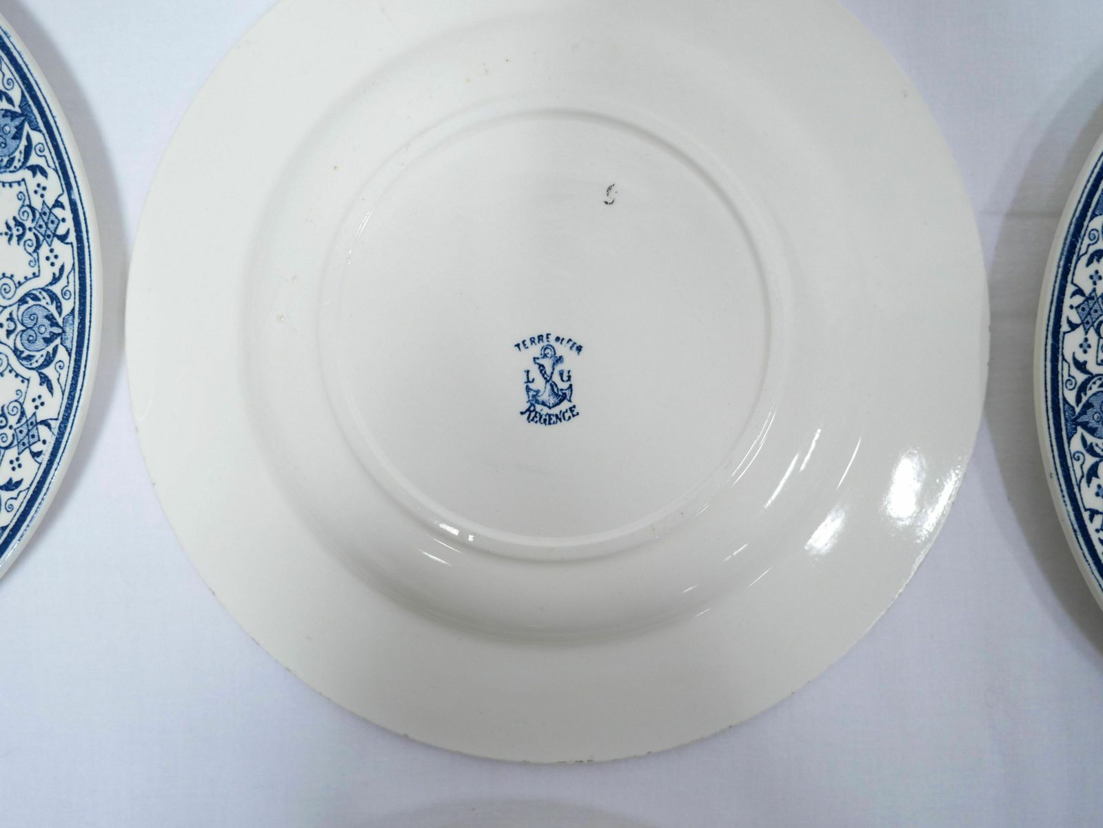 photo furniture Series Of 10 Old Terre De Fer Plates By L.G. For The Earthenware Factory Of