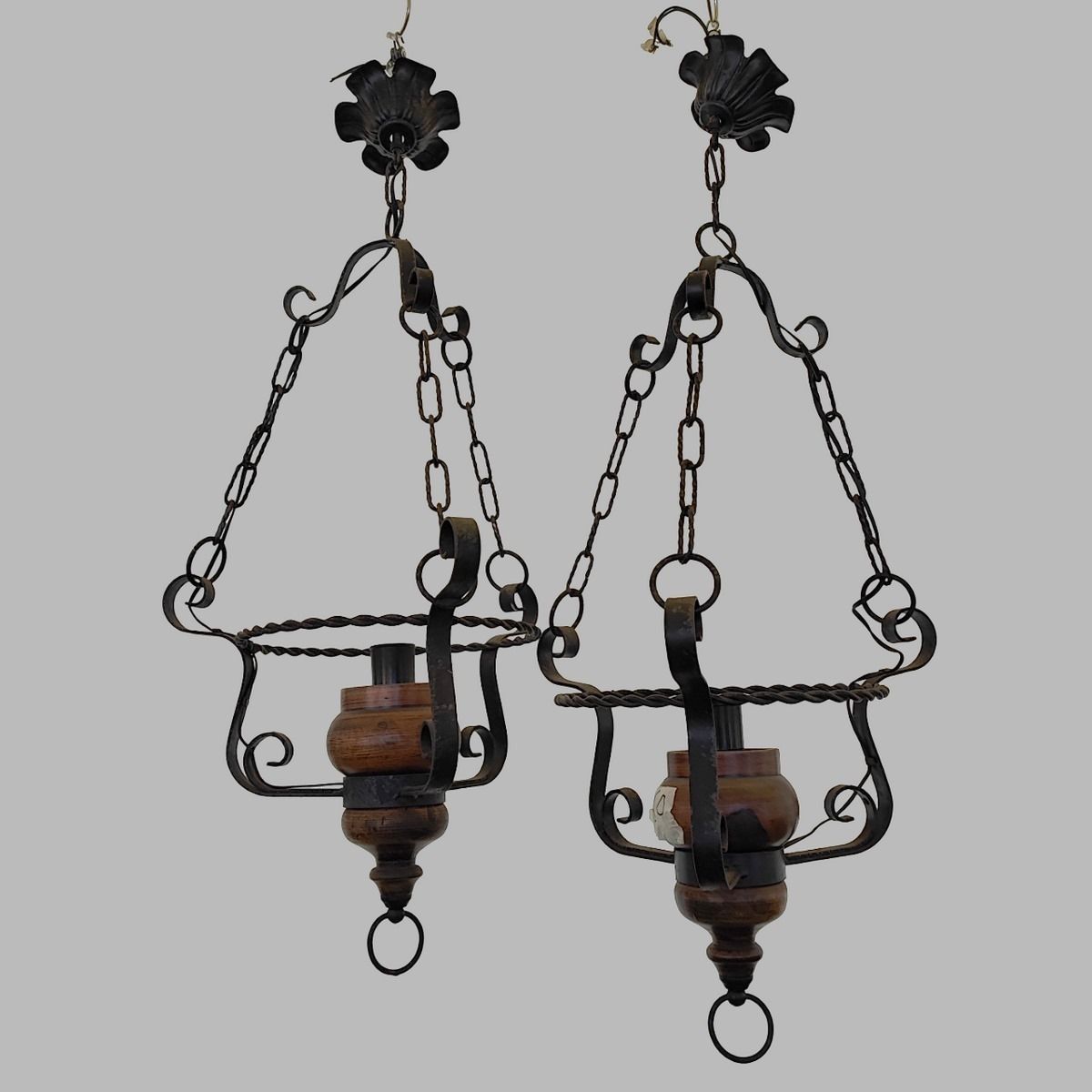 Pair Of Wooden And Metal Chandeliers From The 20th Century