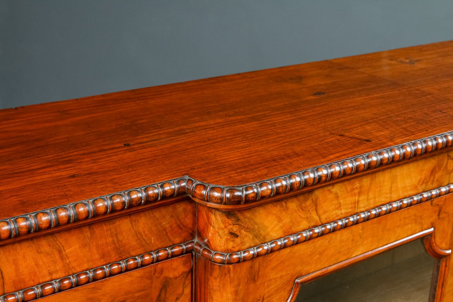 photo vintage English Victorian Burr Walnut Glazed Breakfront Inlaid Display Bookcase (Circa 1860)