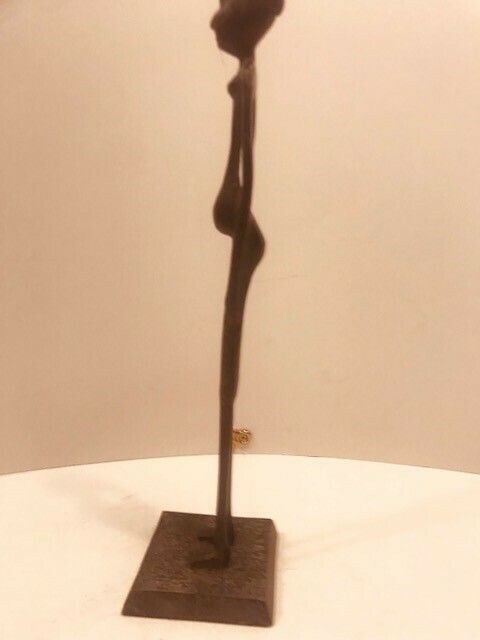 A Metal Statuette Of An African Woman In The Style Of Alberto Giacometti photo buy