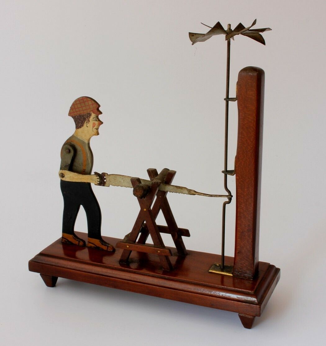 Folk Art Wood Cutter Whirligig. Hand Made Wind Toy Sawing Man. 1932. photo furniture