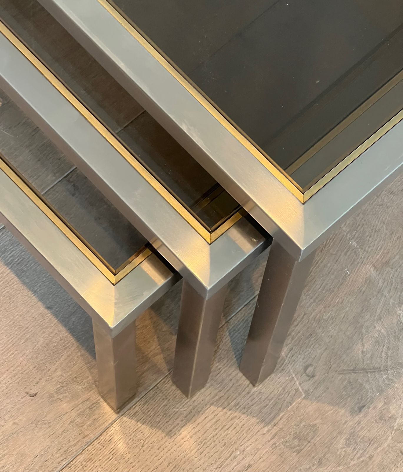 photo furniture Suite Of 3 Nesting Tables In Brushed Steel And Brass Attributed To Guy Lefèvre