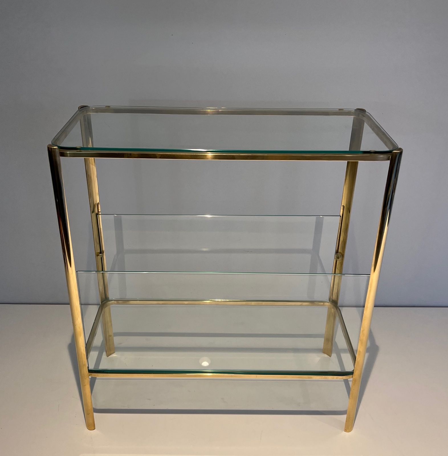 Furniture Magazine Rack In Polished Bronze And Glass Signed Jacques Théophile Lepelletier And Stamped Broncz photo