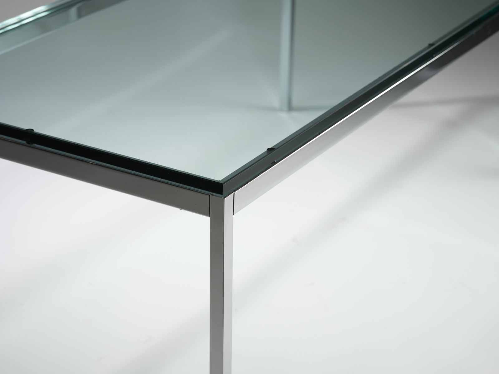 Iconic Florence Knoll For Knoll Studio Chromed Steel & Toughened Glass Coffee Table, Circa 2006.