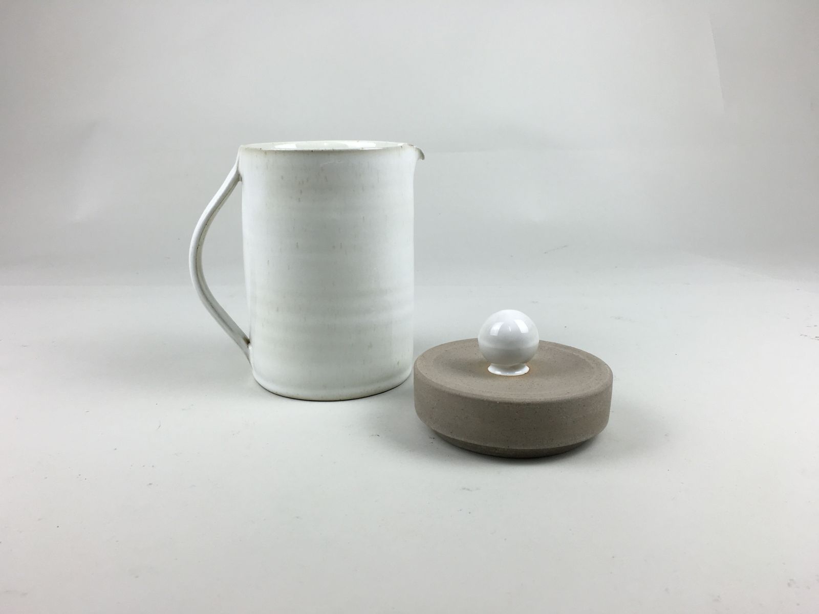 Handmade Stoneware Pottery From France. Large Teapot In Ivory White photo furniture