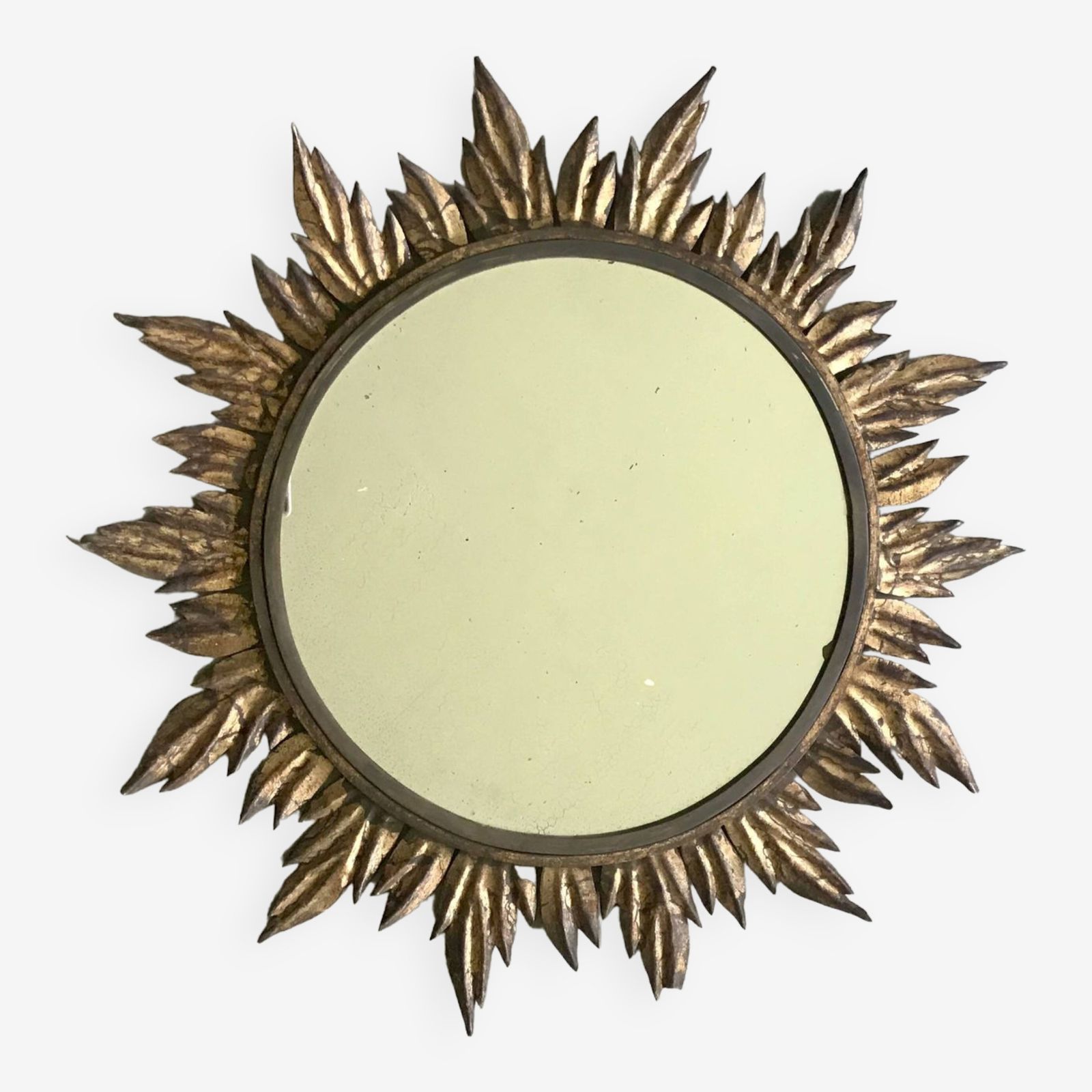 photo for sale Sun Mirror Decorated With Golden Leaves, Circa 1950.