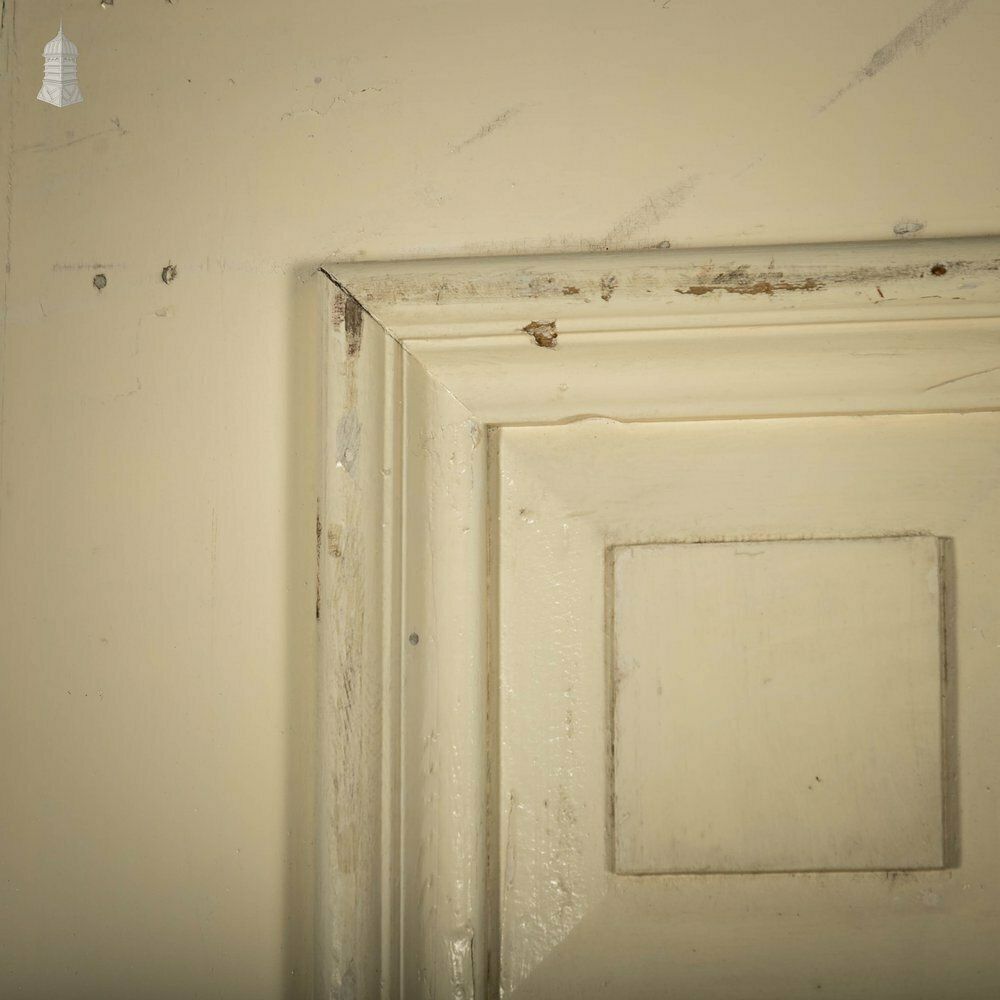 Heavy Fire Door With Mouldings On One Side To Create Panelled Appearance. photo vinterior