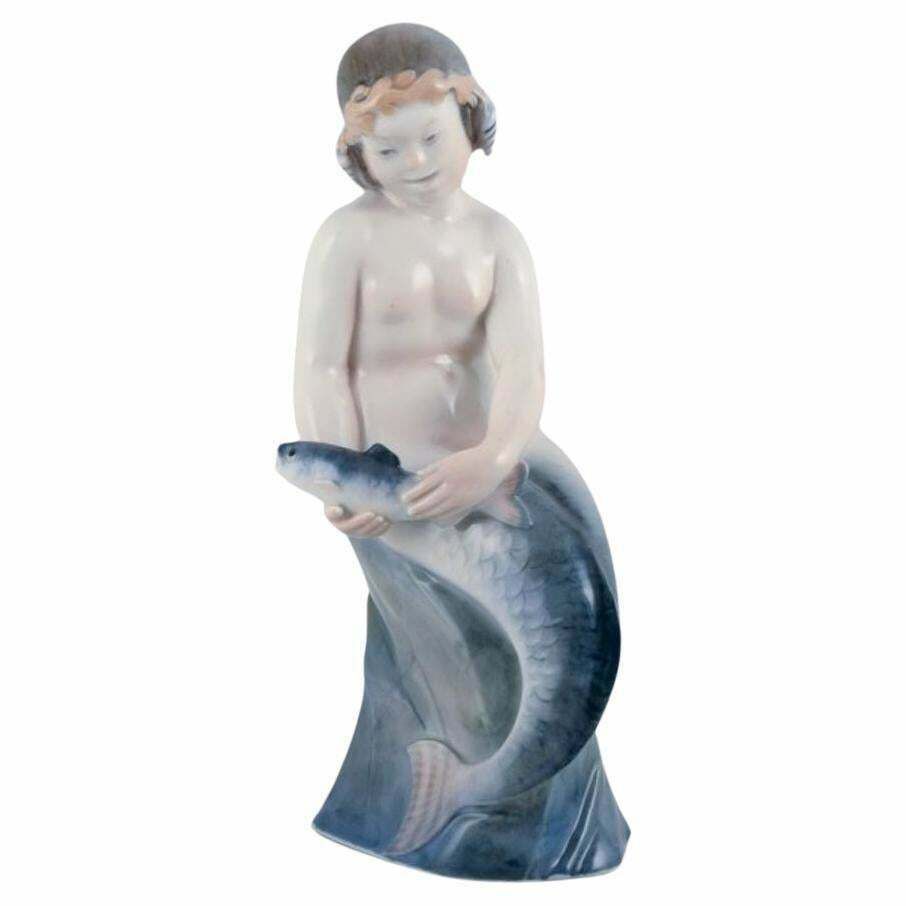 Royal Copenhagen, Rare Porcelain Figurine Of A Mermaid With Fish In Her Hands