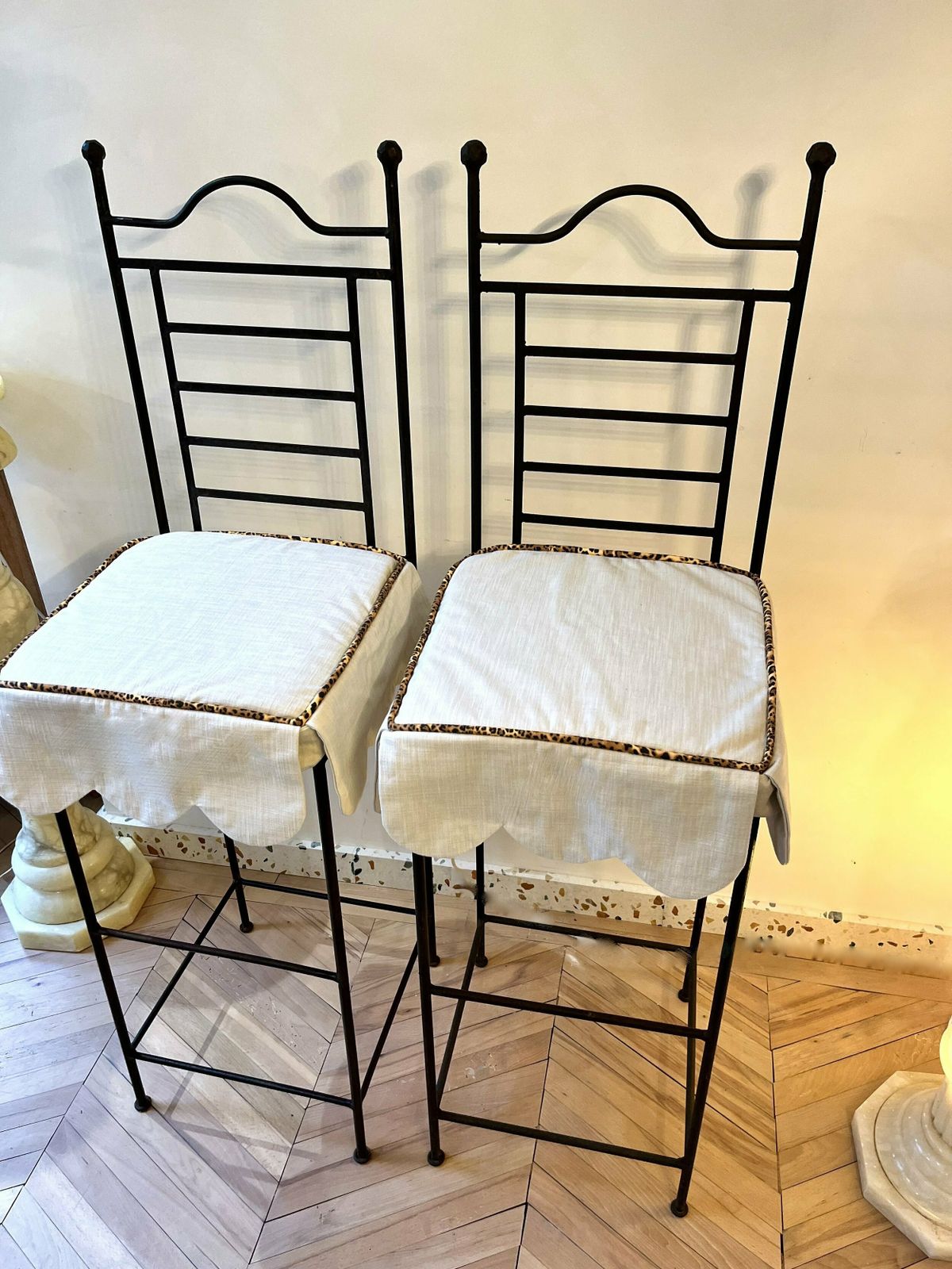 Pair Of Cast Iron Tall Stools With Scalloped Cushions photo for sale