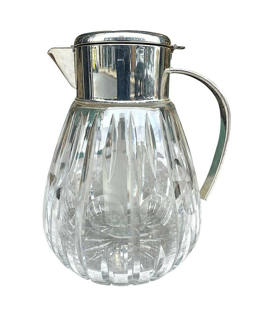 photo furniture A 1960s German Crystal And Silver Plated Lemonade Jug With Central Ice Tube