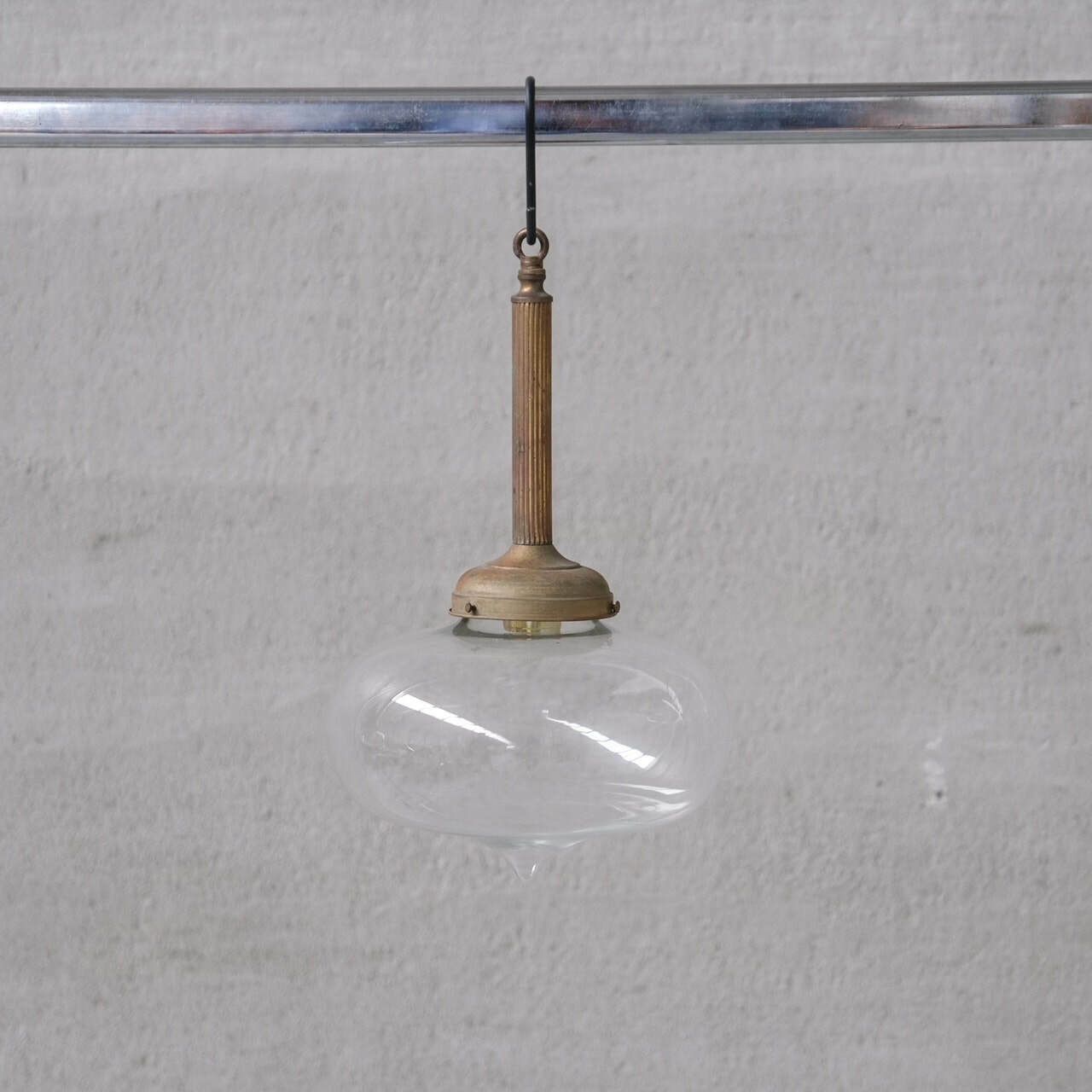 Pair Of Clear Glass And Brass Mid Century Teardrop Pendant Lights photo furniture