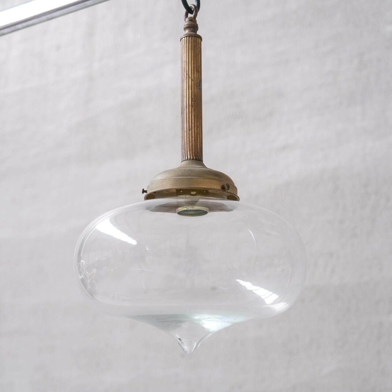 Pair Of Clear Glass And Brass Mid Century Teardrop Pendant Lights photo vintage