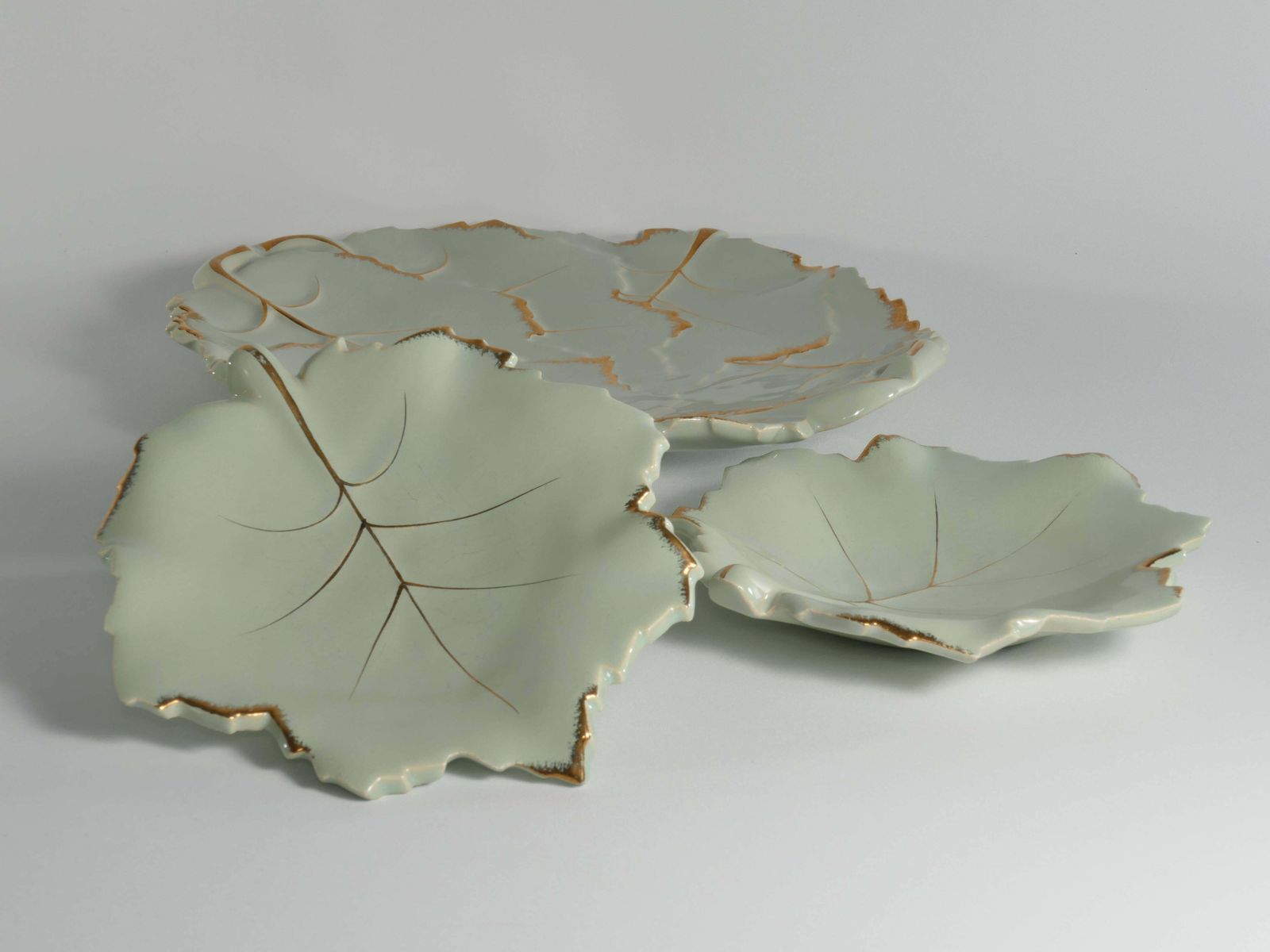 photo buy Art Deco Pistachio And Gold Leaf Plates Viloca Paris Caffarelli