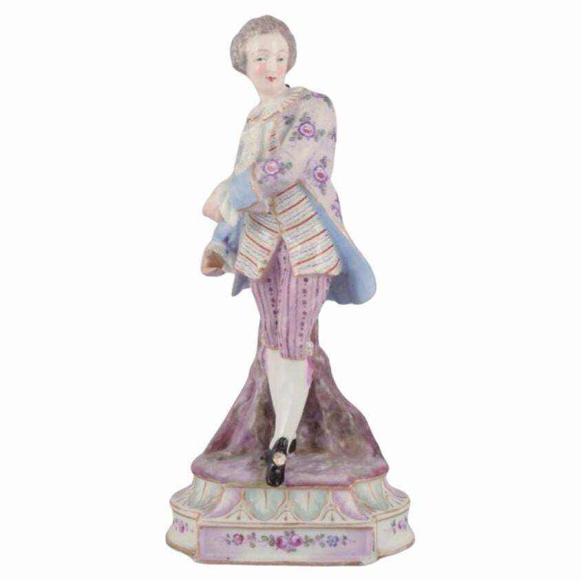 Antique German Porcelain Figurine Of Young Man In Fine Clothes.