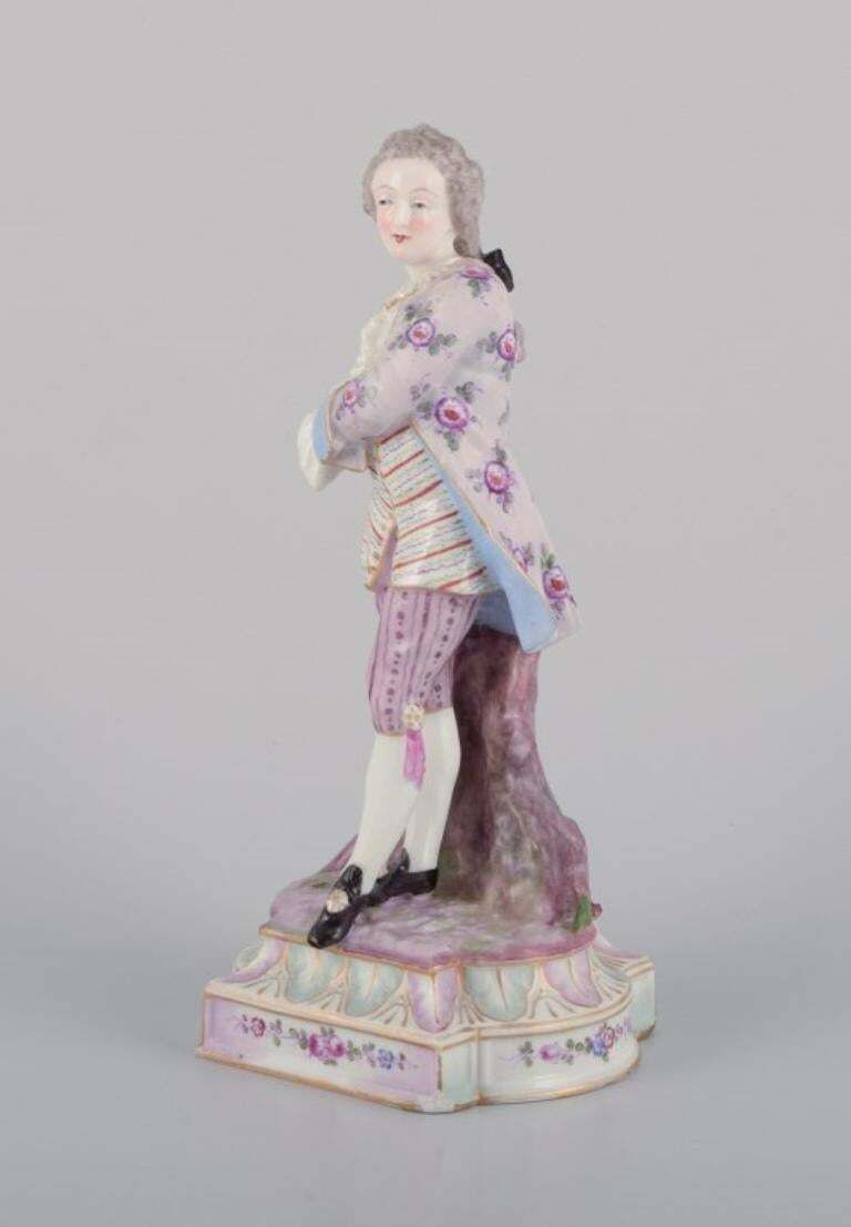 Antique German Porcelain Figurine Of Young Man In Fine Clothes. photo for sale