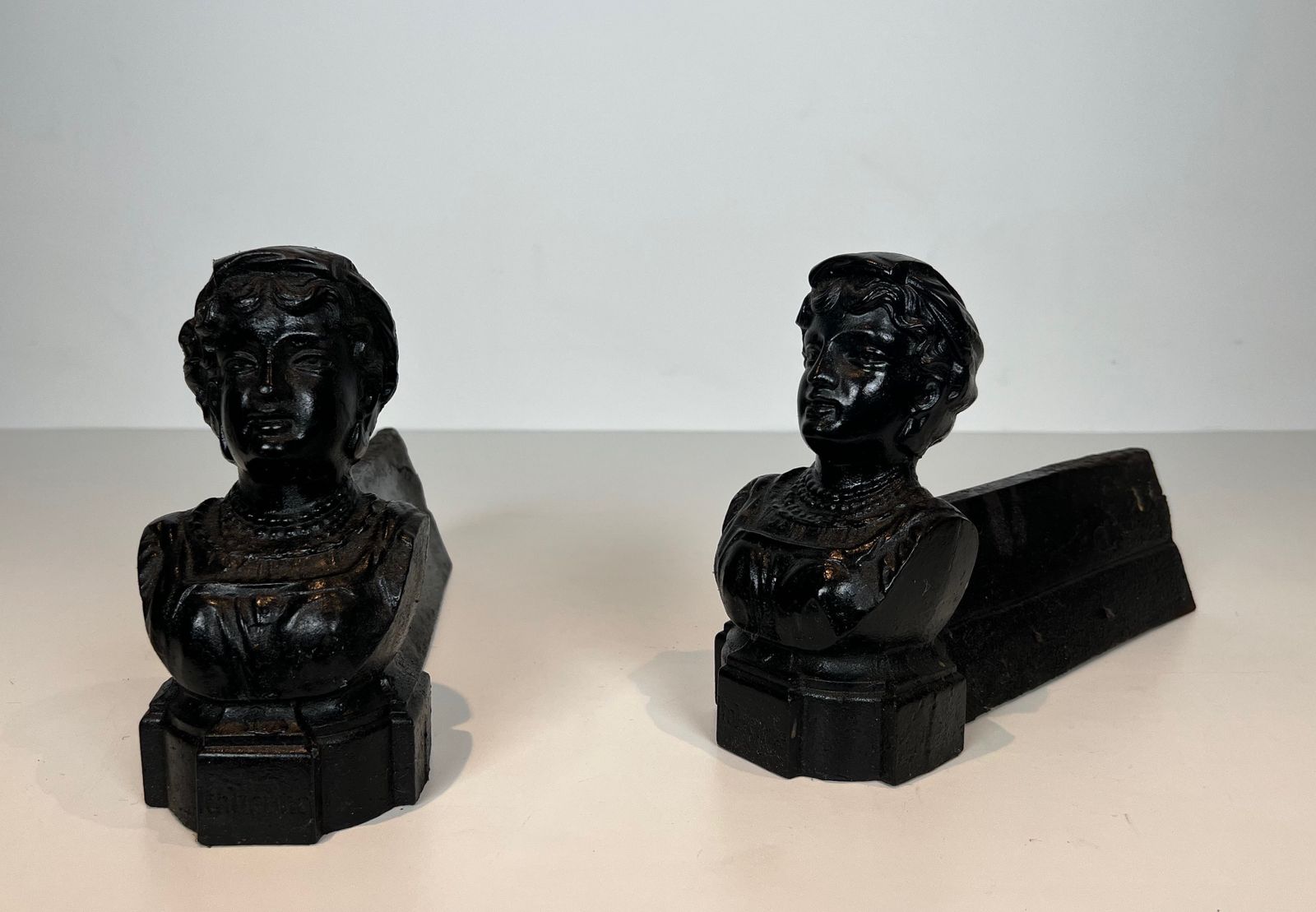 Pair Of Cast Iron Andirons With The Effigy Of An Italian Woman photo for sale