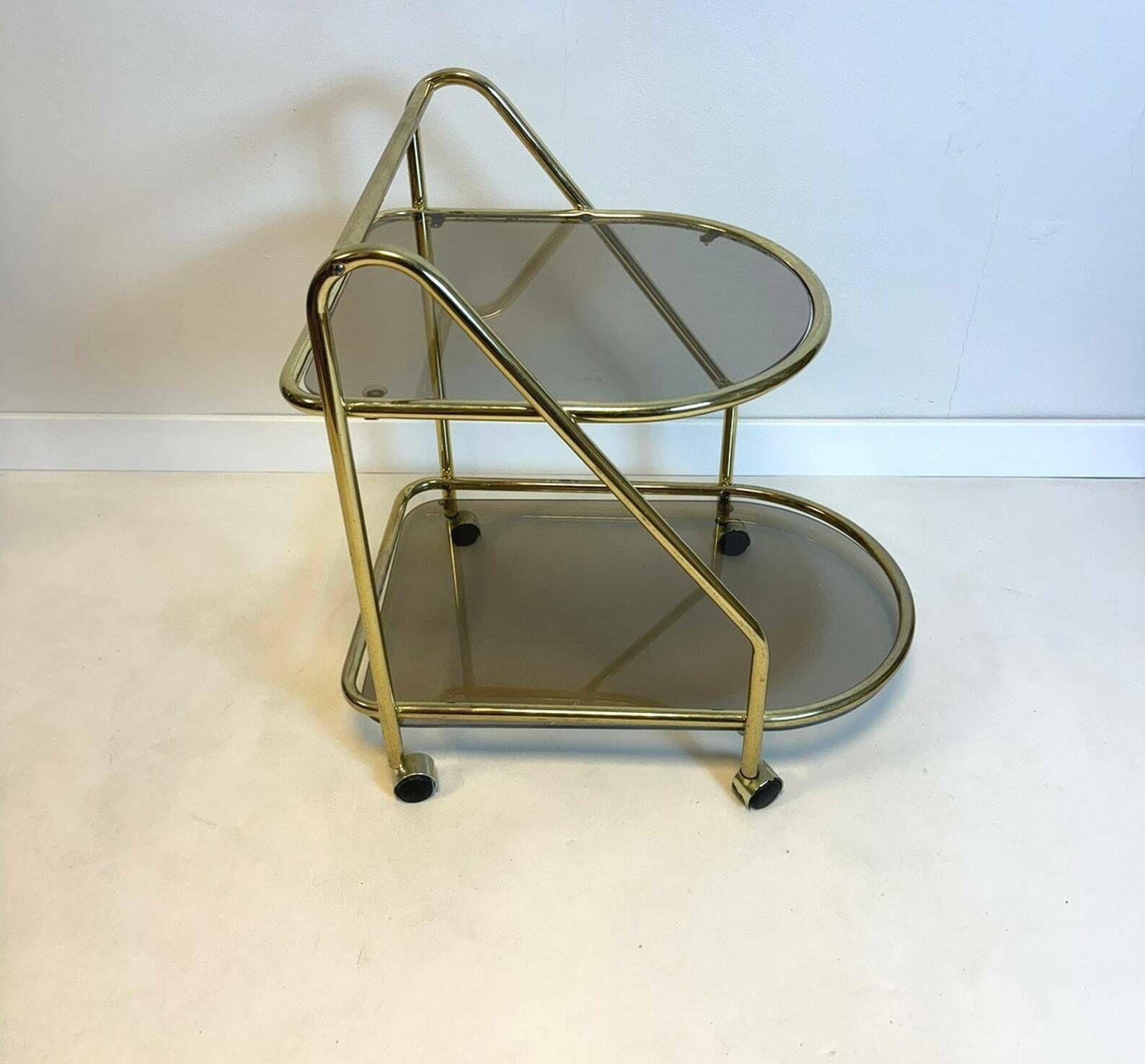 Vintage Hollywood Regency Brass/Smoked Glass Bar Cart photo vintage