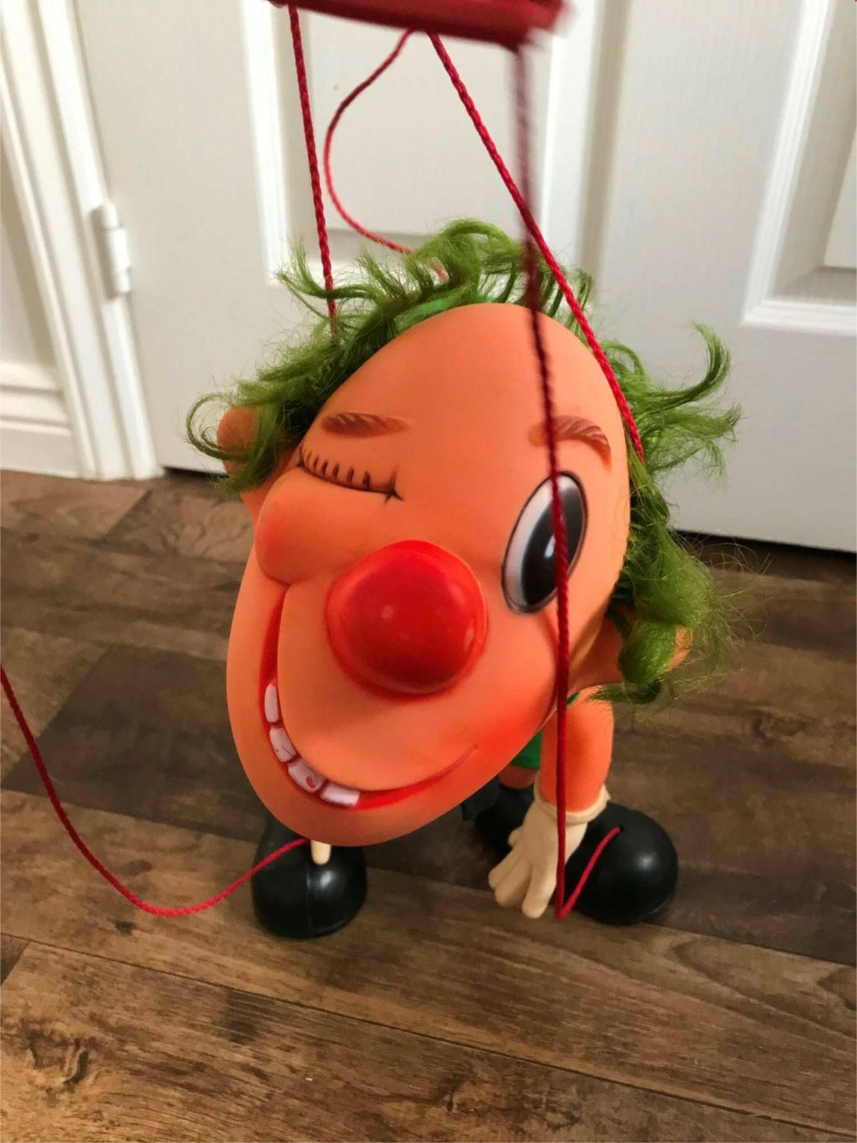 Clown Puppet Retro Kitsch Funny Spanish Farmi Plastic Stooping Grinning photo for sale