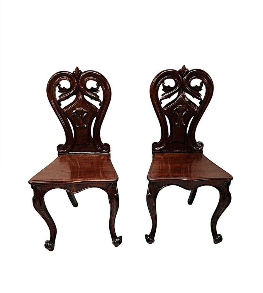 A Stunning Pair Of 19th Century Hall Chairs