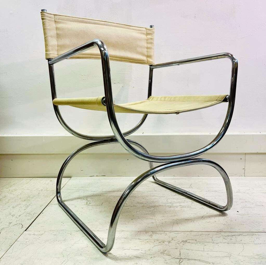 A Pair Of Mid Century Cream Leather And Chrome Chairs Dining Chairs