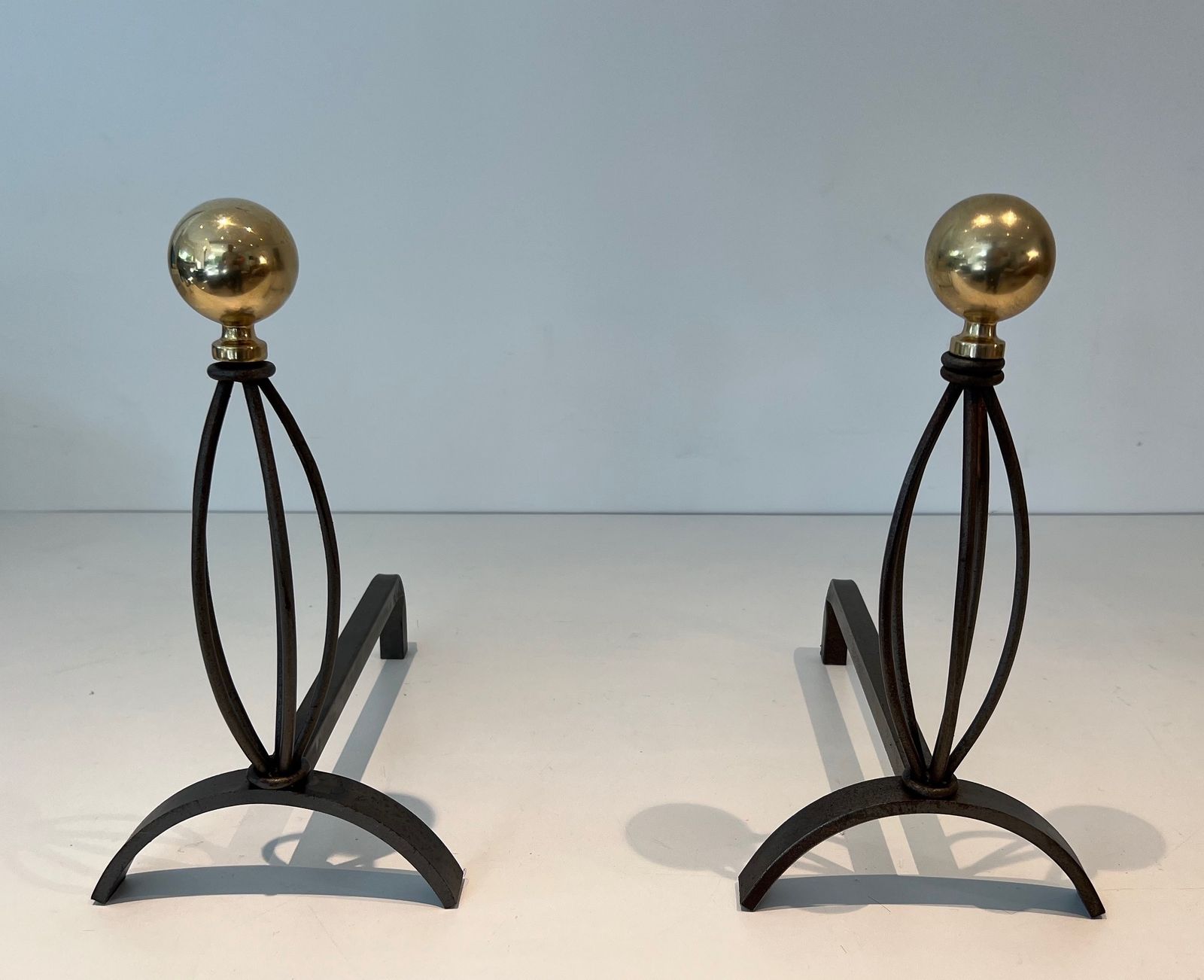 photo furniture Pair Of Wrought Iron And Brass Andirons
