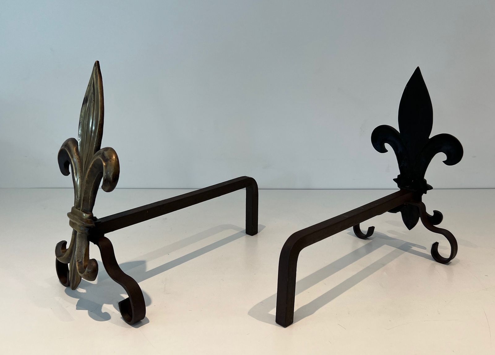 Pair Of Bronze And Wrought Iron Andirons Representing A Fleurs De Lys photo 880.0