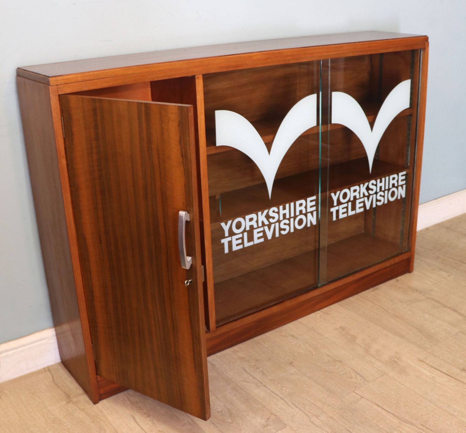 A  Mid Century Retro Style Display Cabinet By Cresta, Sign Written Yorkshire Television. photo for sale