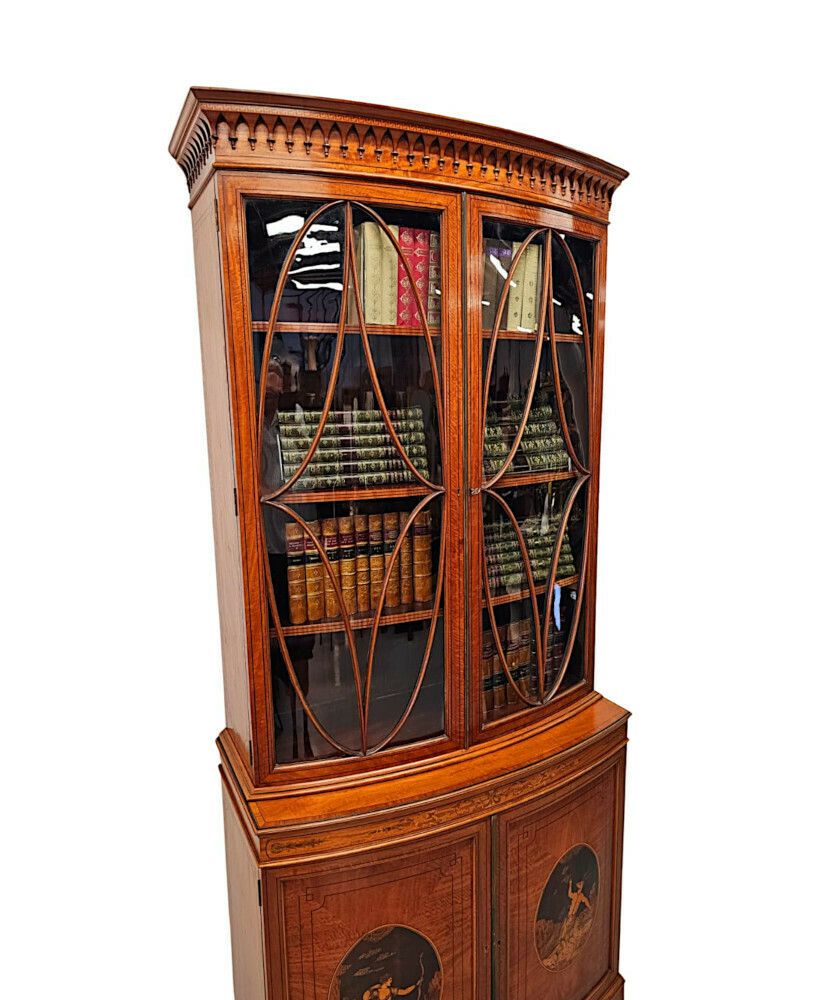 A Very Fine Edwardian Marquetry Inlaid Bowfronted Bookcase In The Manner Of Edward And Roberts photo for sale