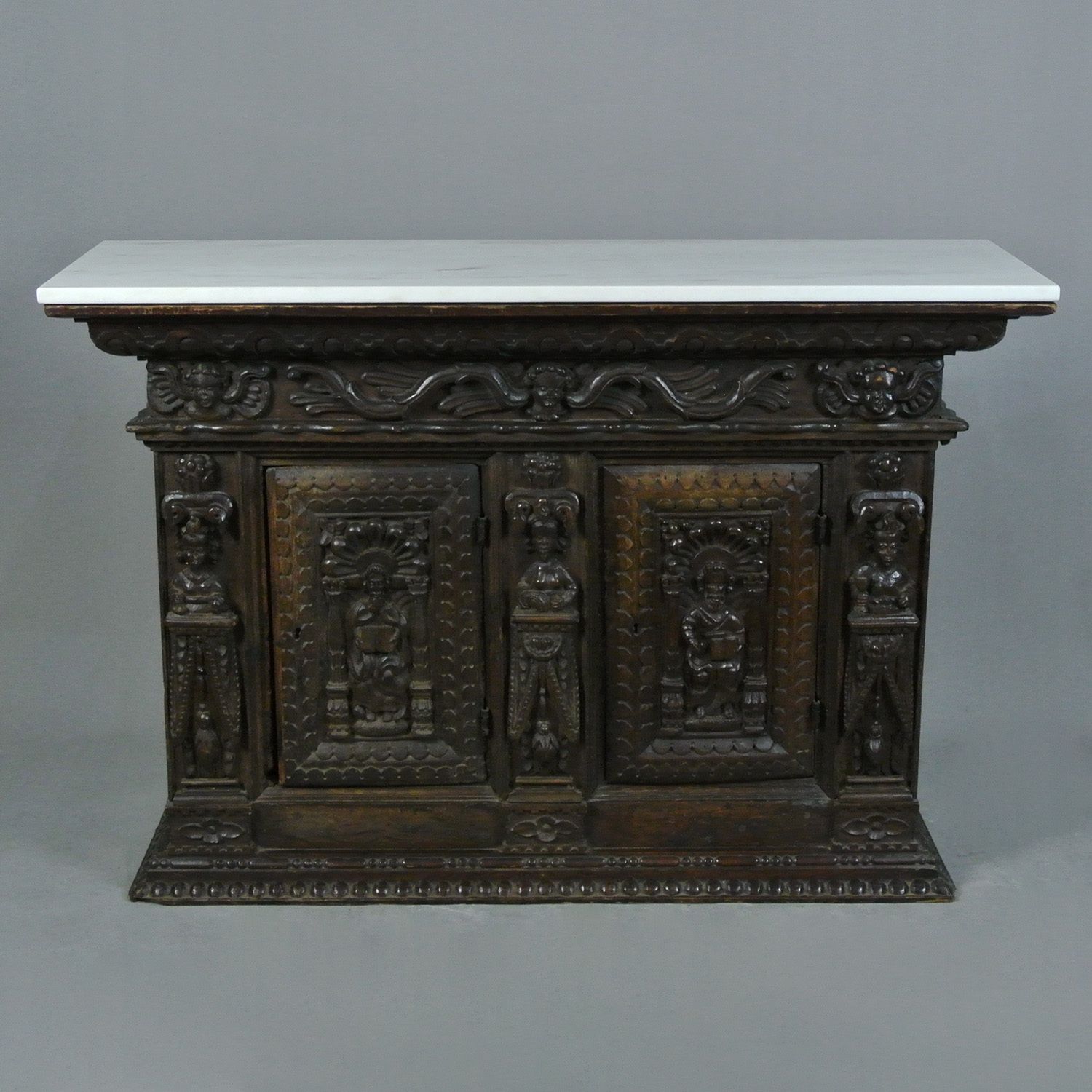 Early 17th Century Figural Carved Oak Livery Cupboard C. 1620