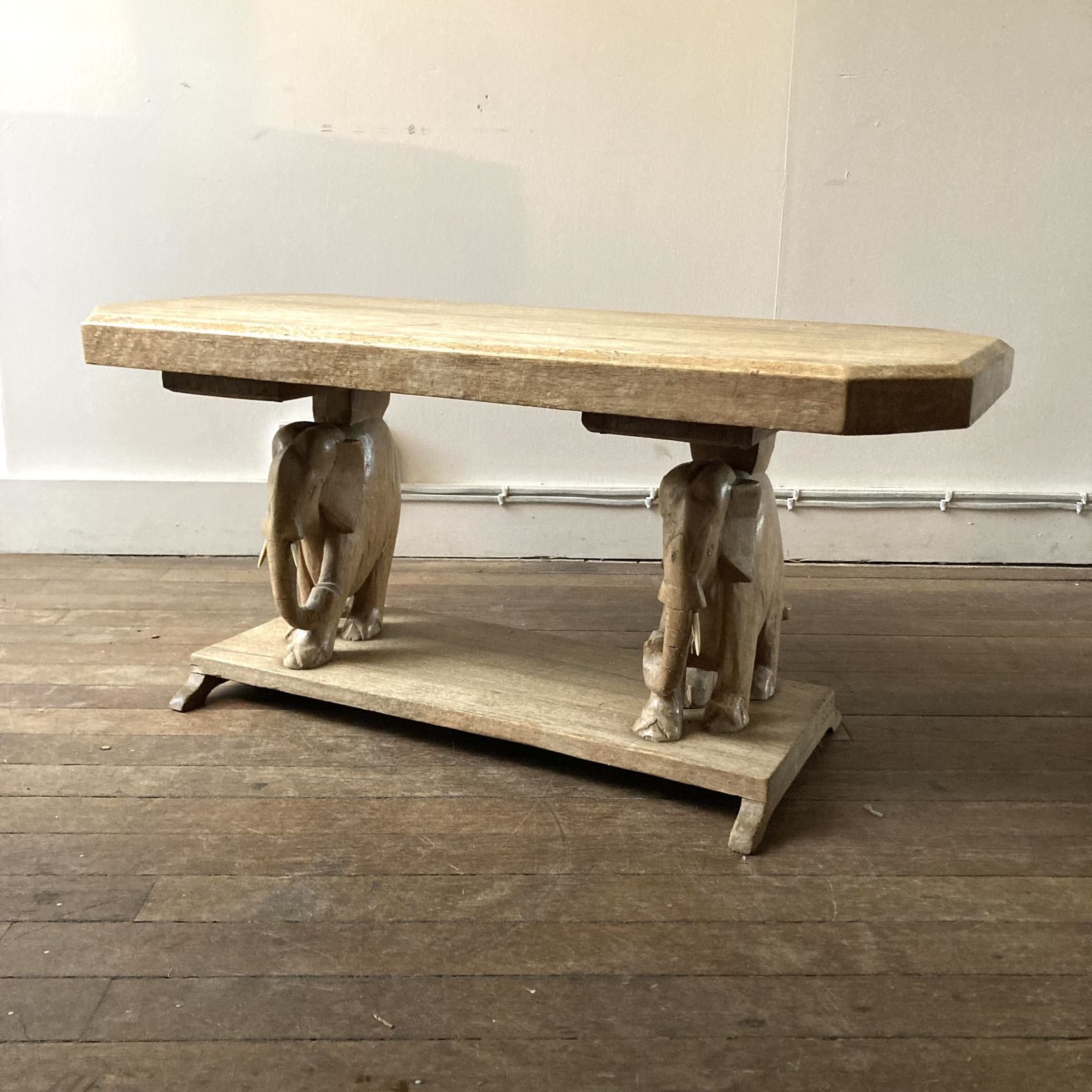 An Exotic Hardwood Low Table With Two Elephant Supports, One Minus A Tusk. 1950s photo Furniture