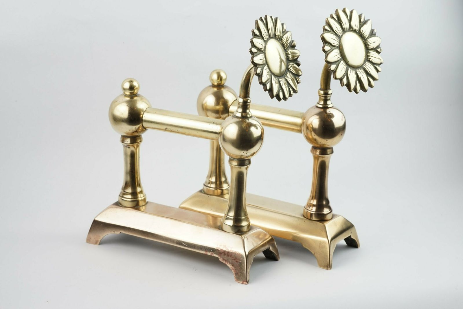 A Pair Of Aesthetic Movement Sunflower Brass Fire Dogs, Circa 1875 photo vintage