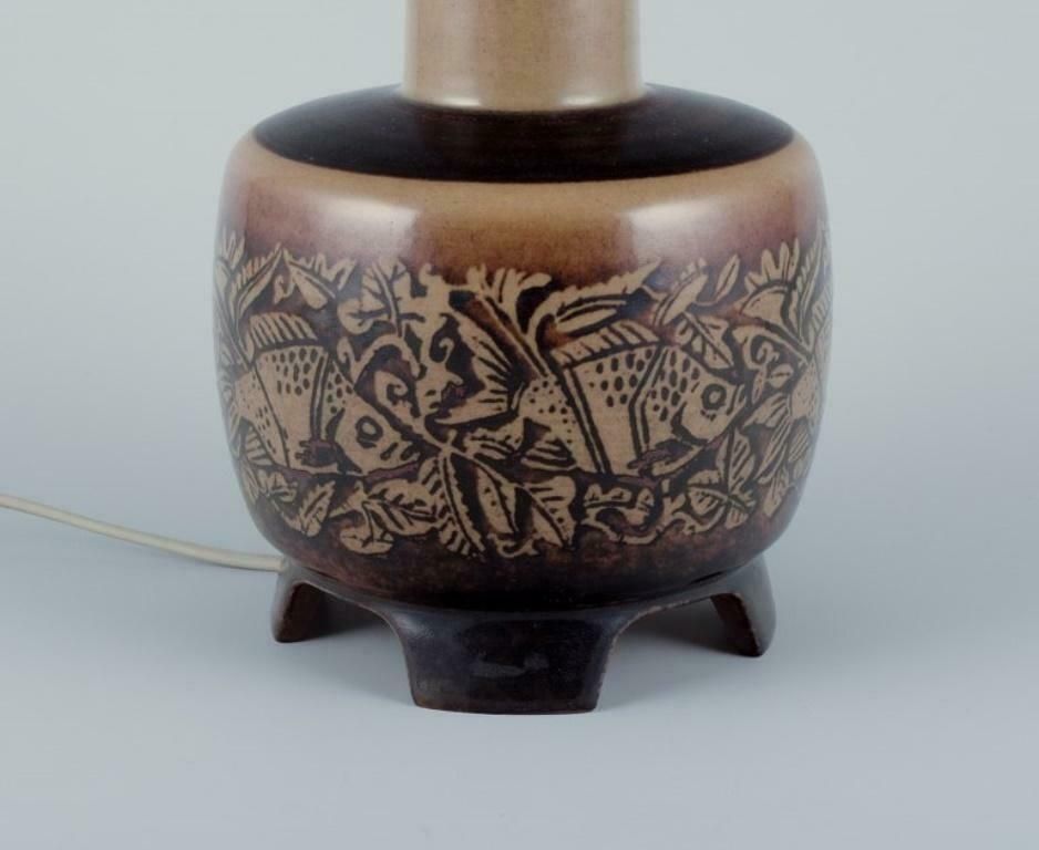 Nils Thorsson For Royal Copenhagen. Table Lamp In Stoneware With A Motif Of Fish photo Lighting