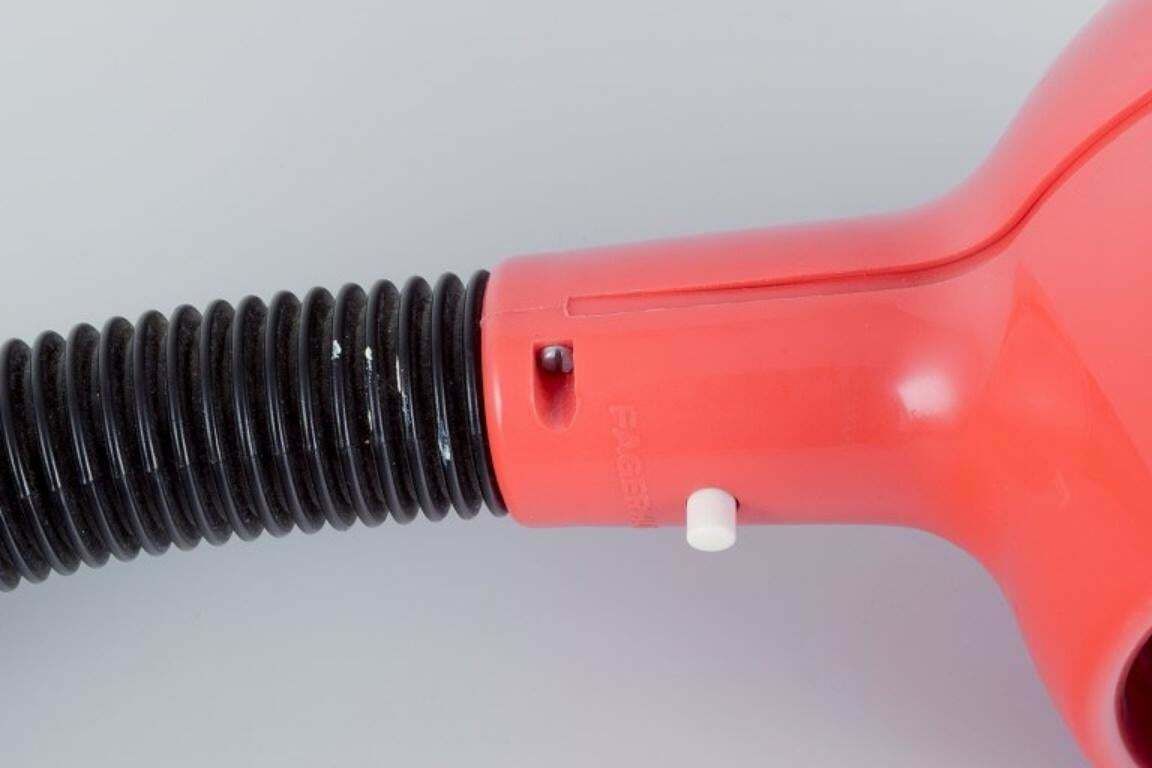Fagerhults, Sweden. Retro Designer Desk Lamp In Orange Plastic. photo Lighting