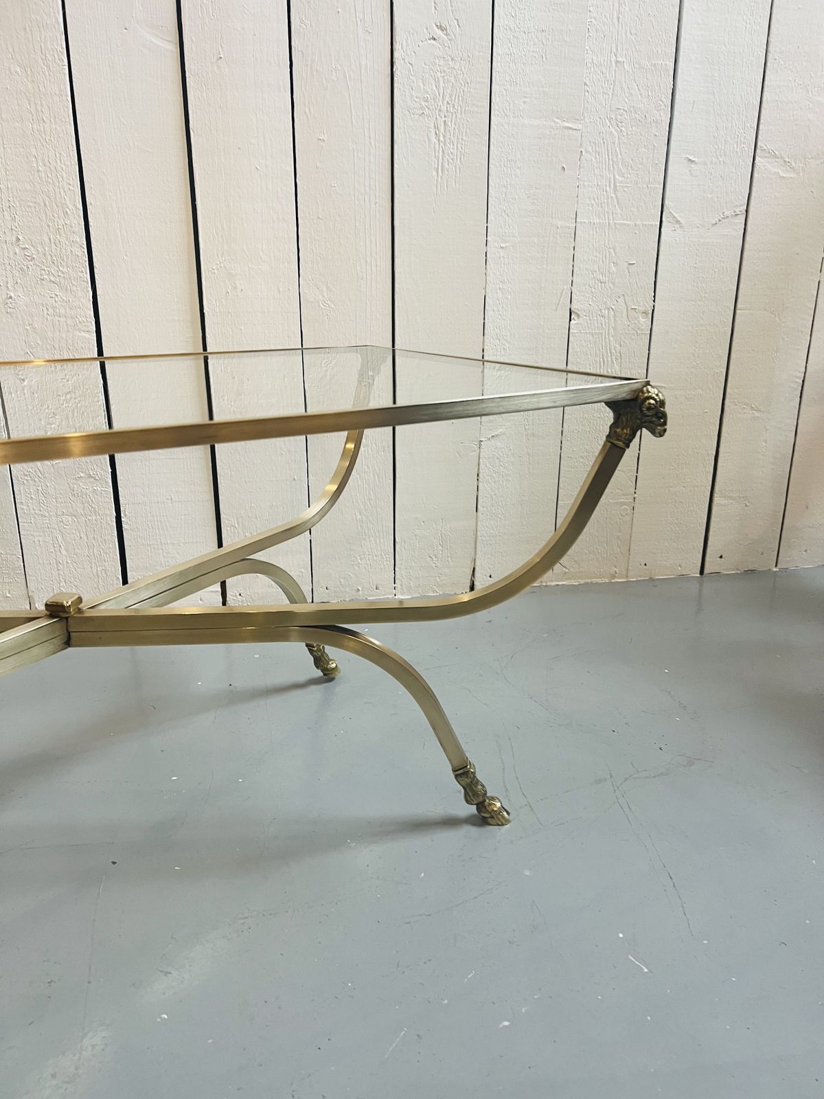 Country House Brass Table Featuring A Ram's Head Design And Hoof