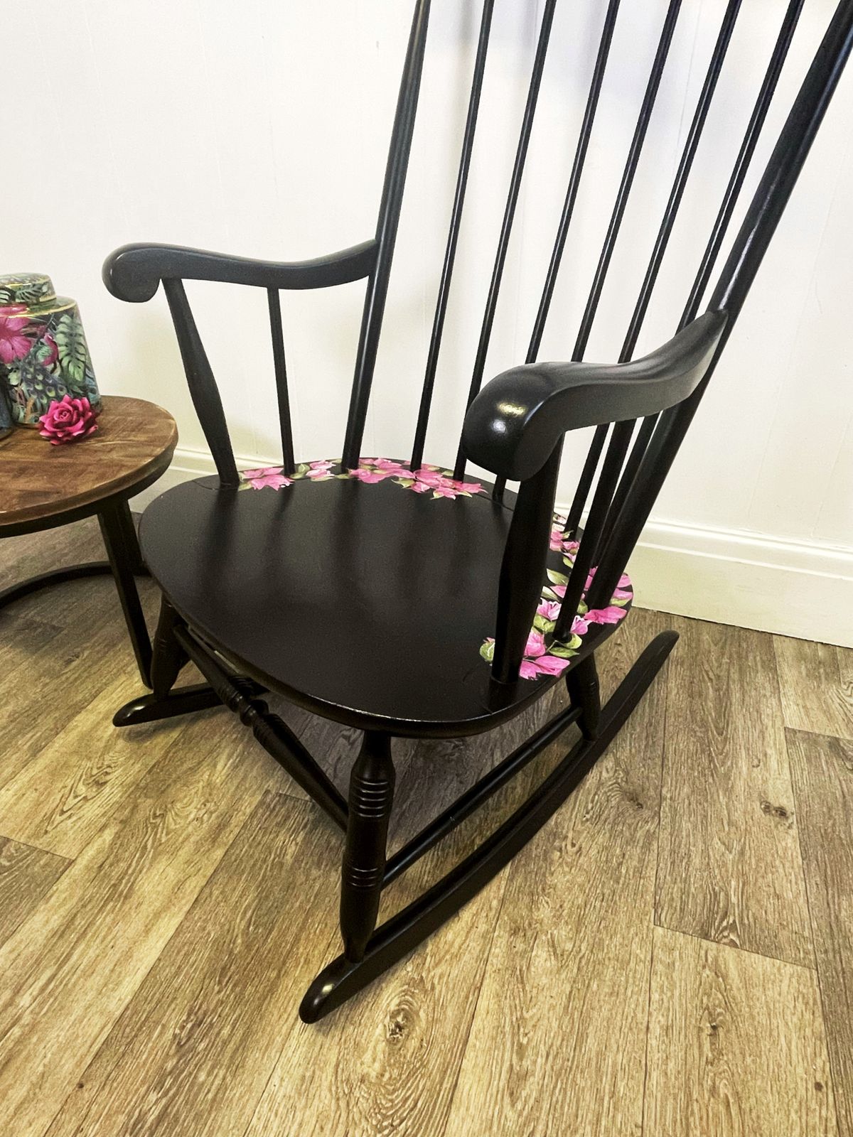 Black Wheel Back Rocking Chair With Pink Flower Design photo furniture